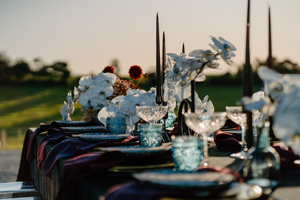 Add a touch of luxury with layered table settings for a romantic winter wedding.