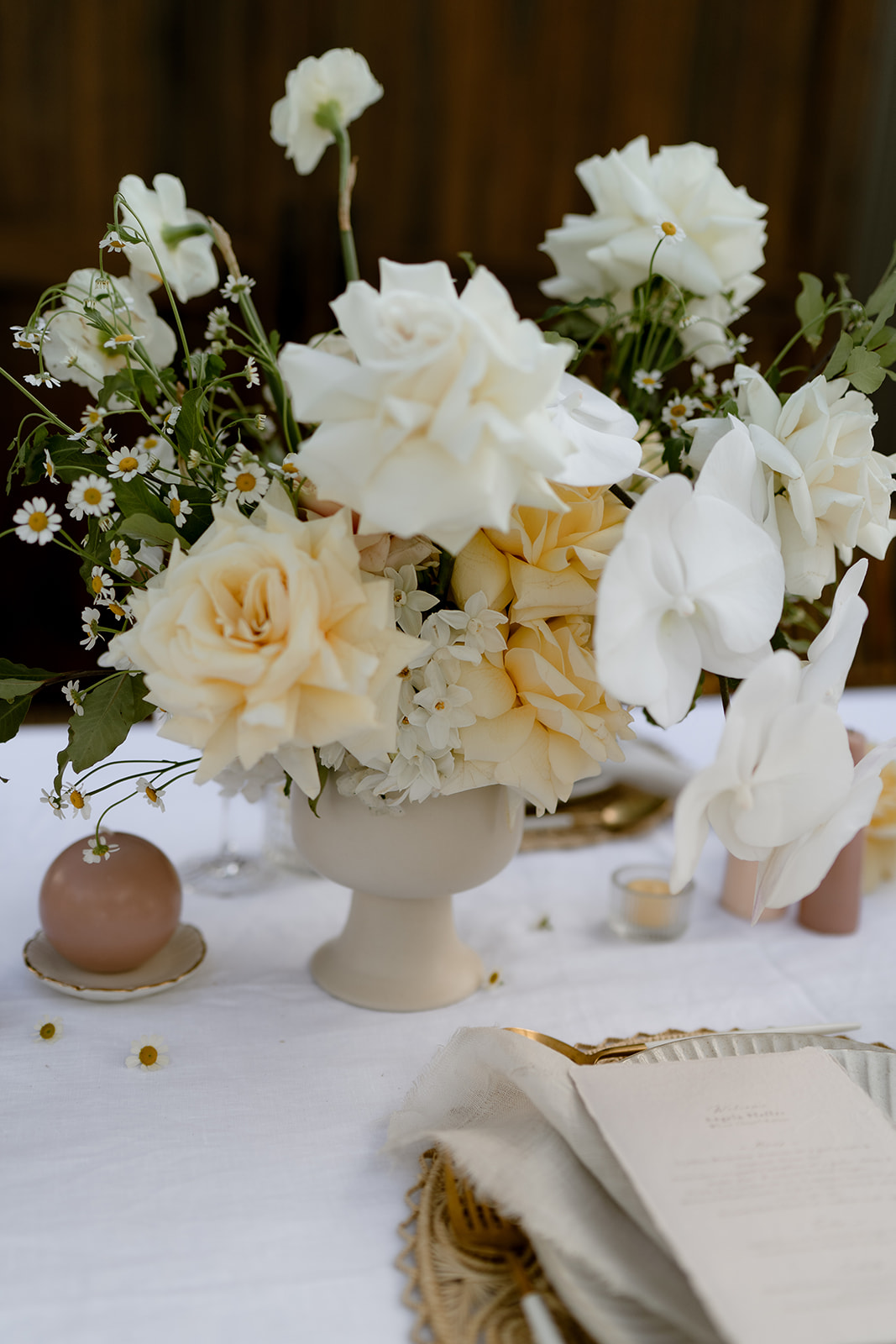 Stunning floral arrangements by Elise Ross from Elyssium Blooms set the scene for this pretty table setting.