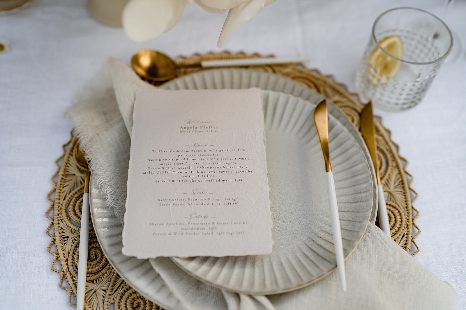 Handmade paper menus adding the finishing touch designed by Danielle Maree Jones from Lily Maree Designs.